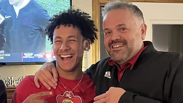 Caleb Benning with Nebraska football head coach Matt Rhule